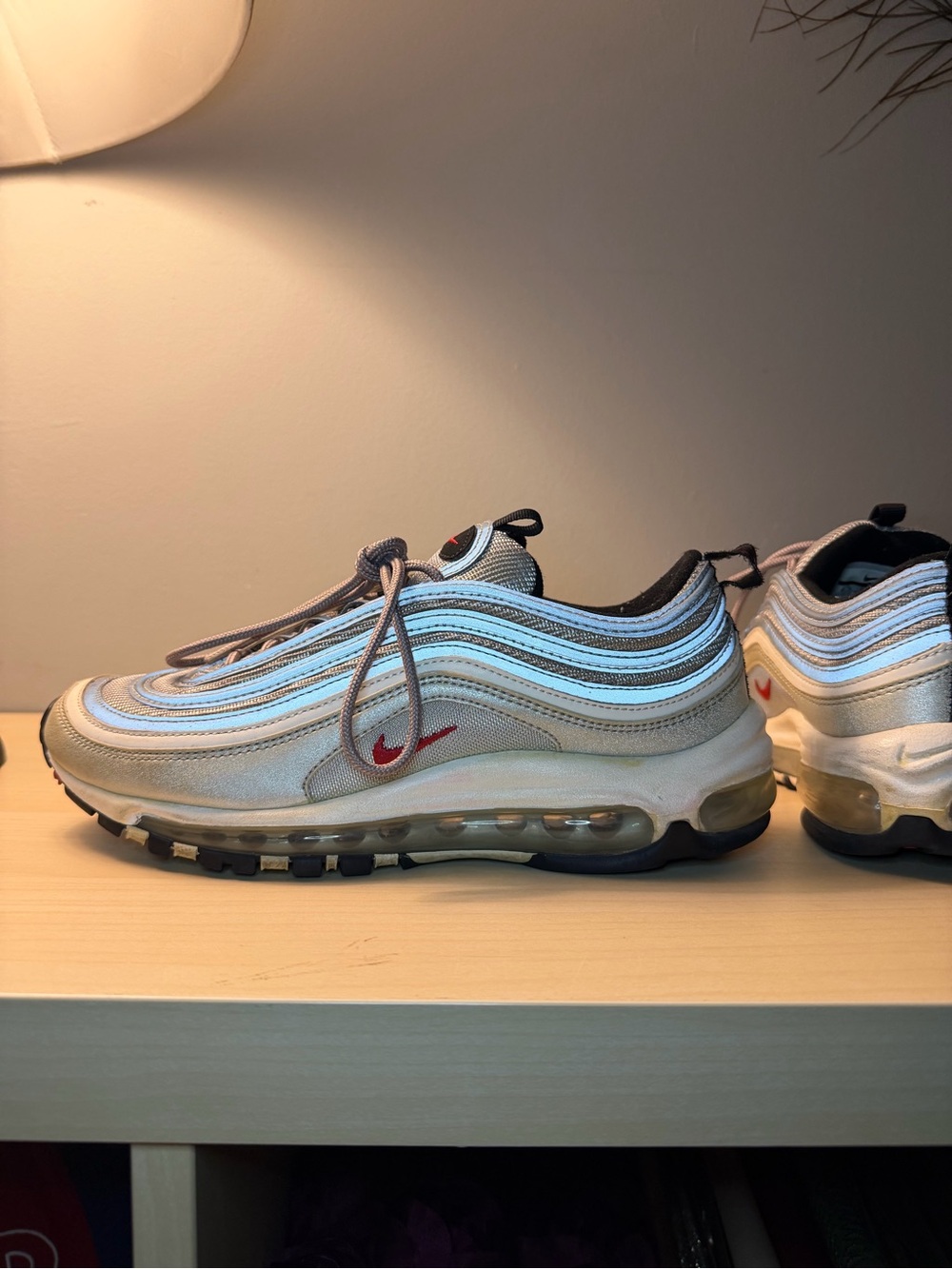 Nike women’s Air Max 97 in Silver with Red Swoosh